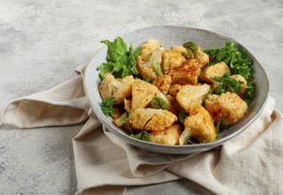 Fried cauliflower salad, with spices and herbs, homemade, no people