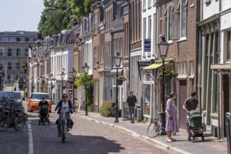 Old town centre of Utrecht, Lange Smeestraat, small side street with houses and small shops,