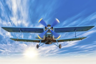 picture of a biplane in the sky