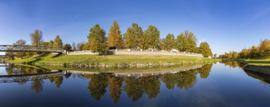 A picture of the Ostravice river and the foliage, in Ostrava, in the fall