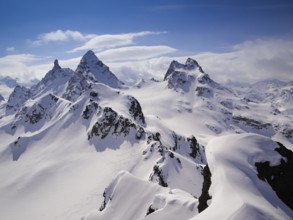 gorgeous mountain landscape in deep winter with impressive peaks in the Alps near Klosters in the