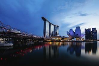 Marina Bay Sand area and Helix Bridge at dusk on a clear day on November 24th 2019
