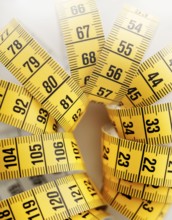 Yellow metric tape measure. Short depth-of-field