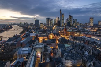 The skyline of a modern city in the evening at sunset. City photo, Römerberg and the financial