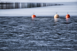 Buoys on the wintry Schluchsee