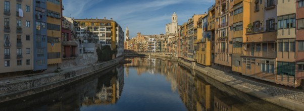 A panorama picture of Girona's Onyar river and its adjacent colorful buildings
