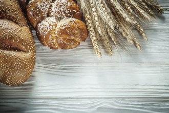 Loaf of bread Wheat ears on white board