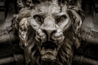 Italy, Turin. Made of stone and located on a marble arch, aroud 300 years old. Fallen angel in the