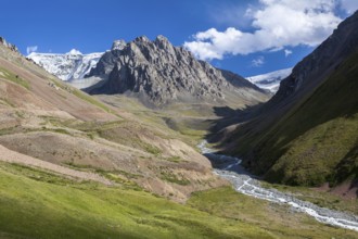 Amazing landscape of mountains, river and sky. Tien Shan, Kyrgyzstan, Asia