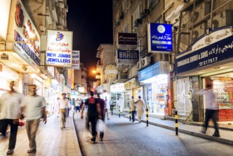 Souk shopping street in central manama city bahrain at night
