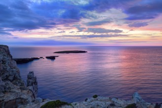 Menorca sunset in Cap de Caballeria cape at Balearic Islands es Mercadal