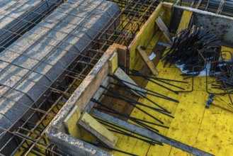 View of construction site with reinforced concrete slab. Concrete slab with reinforncing bars