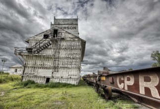 Prairie Grain Elevator in Saskatchewan Canada with storm clouds