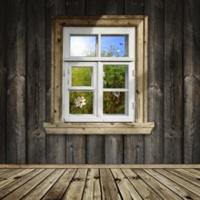 Wooden room with a window overlook the garden
