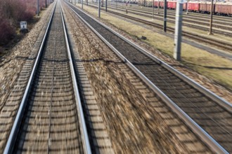 Austria, Upper Austria, Linz, Wels . Railway tracks seen from a moving train between Linz and Wels