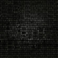 Dark grunge brick wall texture creating a dramatic and textured background, ideal for design