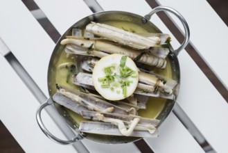 Portuguese fresh razor shell seafood steamed in garlic herb white wine sauce