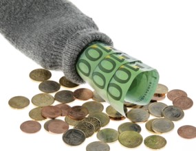 A savings stocking with euro banknotes and euros Austria