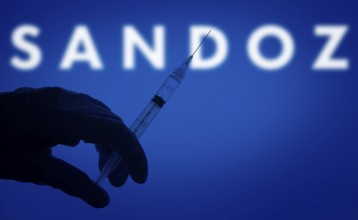 Sandoz logo is displayed on smartphone. Sandoz Group AG is a Swiss company generic pharmaceuticals