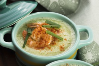 Cold cucumber soup with herbs and prawns
