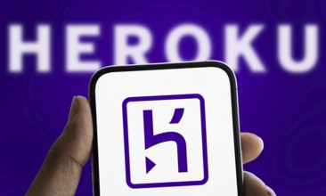 heroku logo is displayed on smartphone. Heroku is a cloud platform as a service