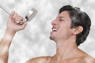 Young man performing a concert by singing in the shower