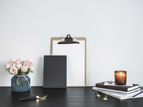 Empty chalkboard on table. Home office concept or mockup. Chalkboard mock up portrait format, copy