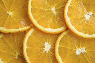 Slices of orange or tangerine isolated on white background