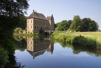 The beautiful castle Vorden in the village of the same name in the Achterhoek, reflecting in its