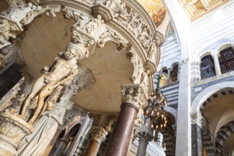 Pisa, Italy, 29 June 2023. Cathedral interior. The pulpit, Medieval art masterpiece by sculptor
