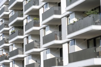 Detail of the façade of a white modern residential building in Berlin, Germany, Europe