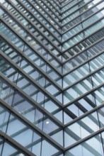 A full frame modern office architecture abstract with geometric angular reflected shapes and lines