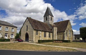 Church in the central square a small town in Normandy, France, Europe