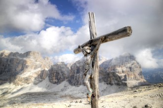 Dolomites, detail of the crucifix of the Tofane mountain group, a UNESCO World Heritage Site in