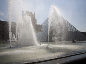 Courtyard of the Louvre with pyramid by Ieoh Ming Pei