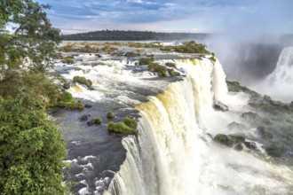 Tourists at Iguassu Falls at Iguassu National Park, World Natural Heritage Site by UNESCO