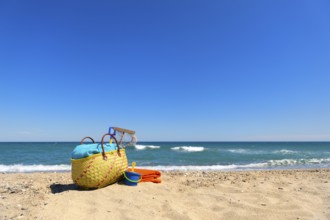 Beach bag and toys for summer vacation