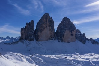 Tre Cime Di Lavaredo. The Three Peaks on Sunny Day in Winter. Aerial View. Sexten Dolomites, South