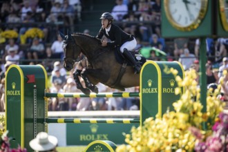 Michael Pender of Ireland and riding HHS Calais compete in the first round of the 1.60m CPKC