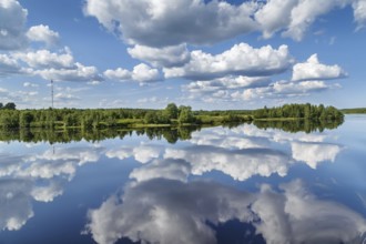 Landscape with a symmetrical reflection on the Vyg river (part of the White Sea-Baltic Canal),