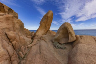 Coastal landscape with bizarre red rocks and sea view, Spiaggia di Cala E'Luas, Ogliastra,