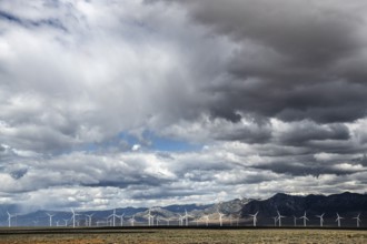 Wind turbines during a storm on Highway 50, Loneliest Road in America, Ely, Nevada, USA, North