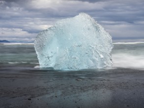 Diamond Beach, iceberg on black lava beach, near Jökulsarlon glacier lagoon, Vatnajökull National