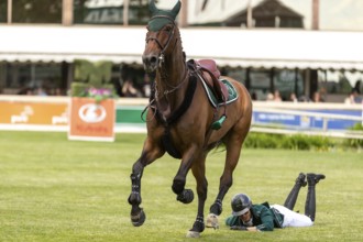 Abdulrahman Alrajhi of Saudi Arabia loses his mount, Ventago, during the 1.60m RBC Grand Prix of