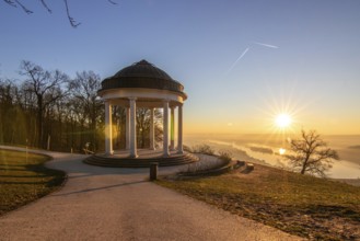 Beautiful temple in a landscape shot. Sunrise on a winter morning. Beautiful view along the Rhine