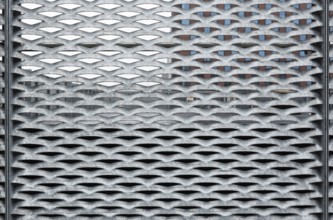 Leuven, Flemish Brabant, Belgium, 12 18 2021: Abstract close up of a metal grid with patterns,