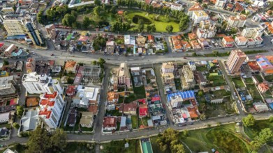 La Paz, Bolivia, aerial view flying over the dense, urban cityscape. San Miguel, southern distric.