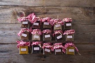 Of small glass jars for storage of various types of aromas for international cuisine