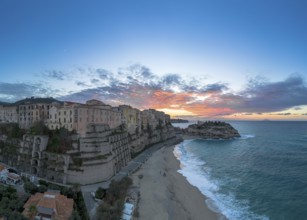 Tropea, Italy, 16 December, 2023: panorama view of Rotonda Beach and the colourful old town of