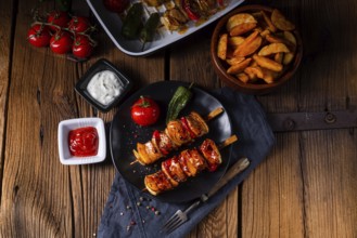 Marinated kebabs with meat and vegetables